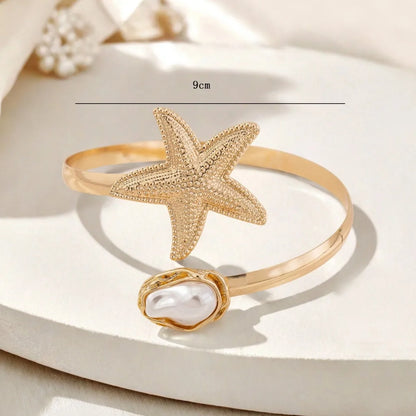 🌸"Golden Bloom" 💛 Brazalete Flor Metalizada Estilo Diosa