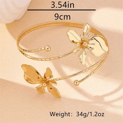 🌸"Golden Bloom" 💛 Brazalete Flor Metalizada Estilo Diosa